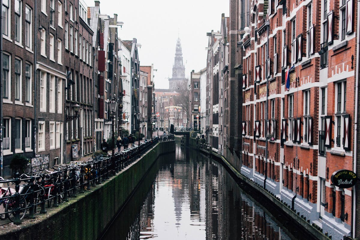 Amsterdam canal buildings with houseboats